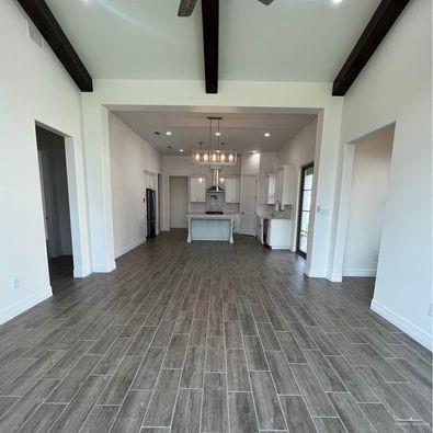 804 Grayson Avenue McAllen, TX 78504 - Photo 3 of 30 a view of a kitchen with a sink and refrigerator