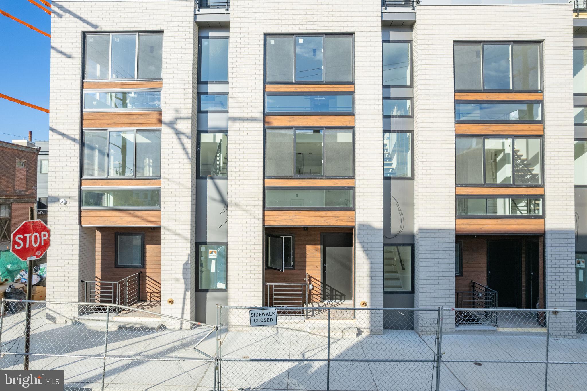 2607 East Boston Street, Unit 1 Philadelphia, PA 19125 - Photo 23 of 25 a front view of a multi story building