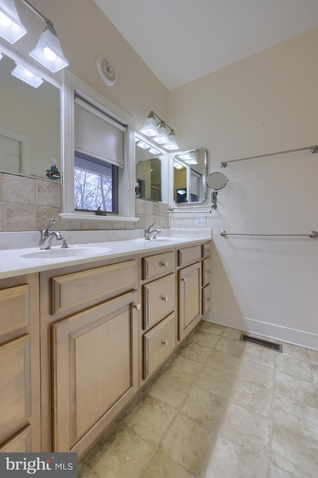 4495 Beards School Road Spring Grove, PA 17362 - Photo 22 of 57 a bathroom with a sink and a mirror