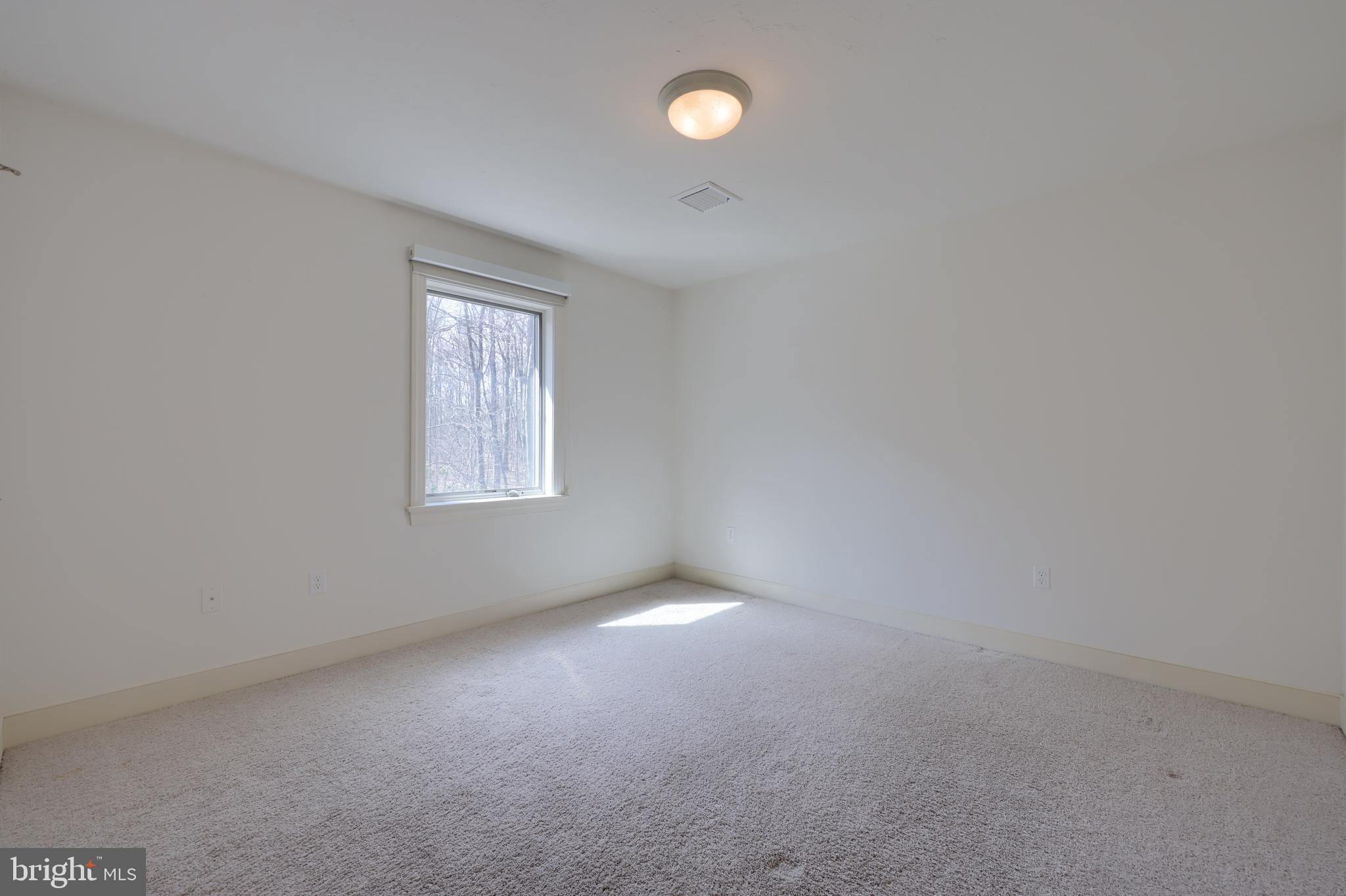 4495 Beards School Road Spring Grove, PA 17362 - Photo 32 of 57 an empty room with a window