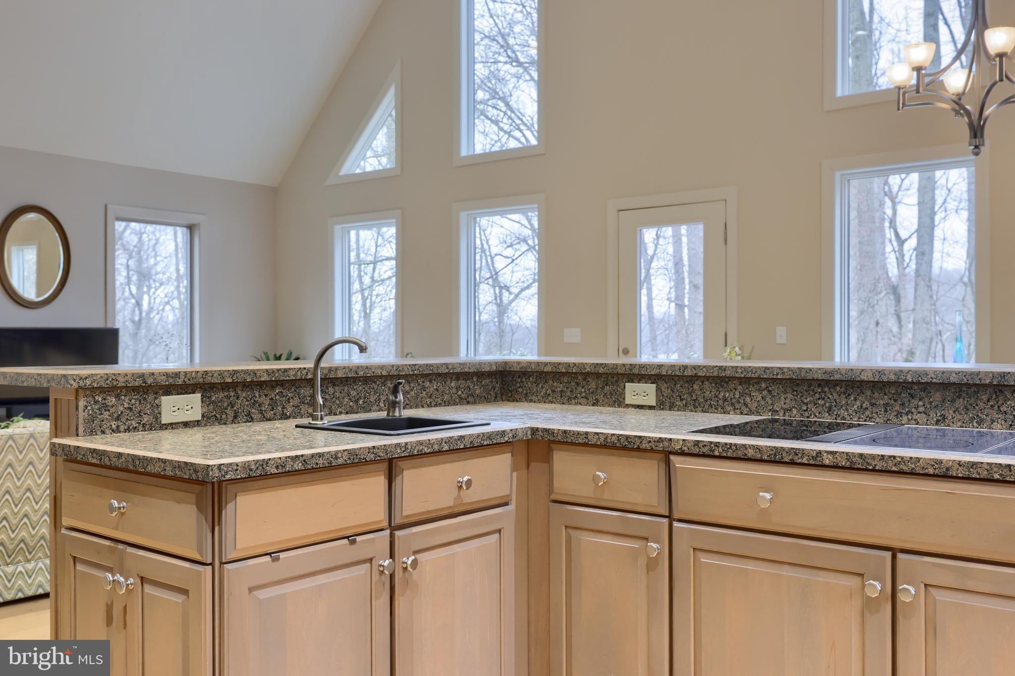 4495 Beards School Road Spring Grove, PA 17362 - Photo 8 of 57 a bathroom with a granite countertop sink and a mirror