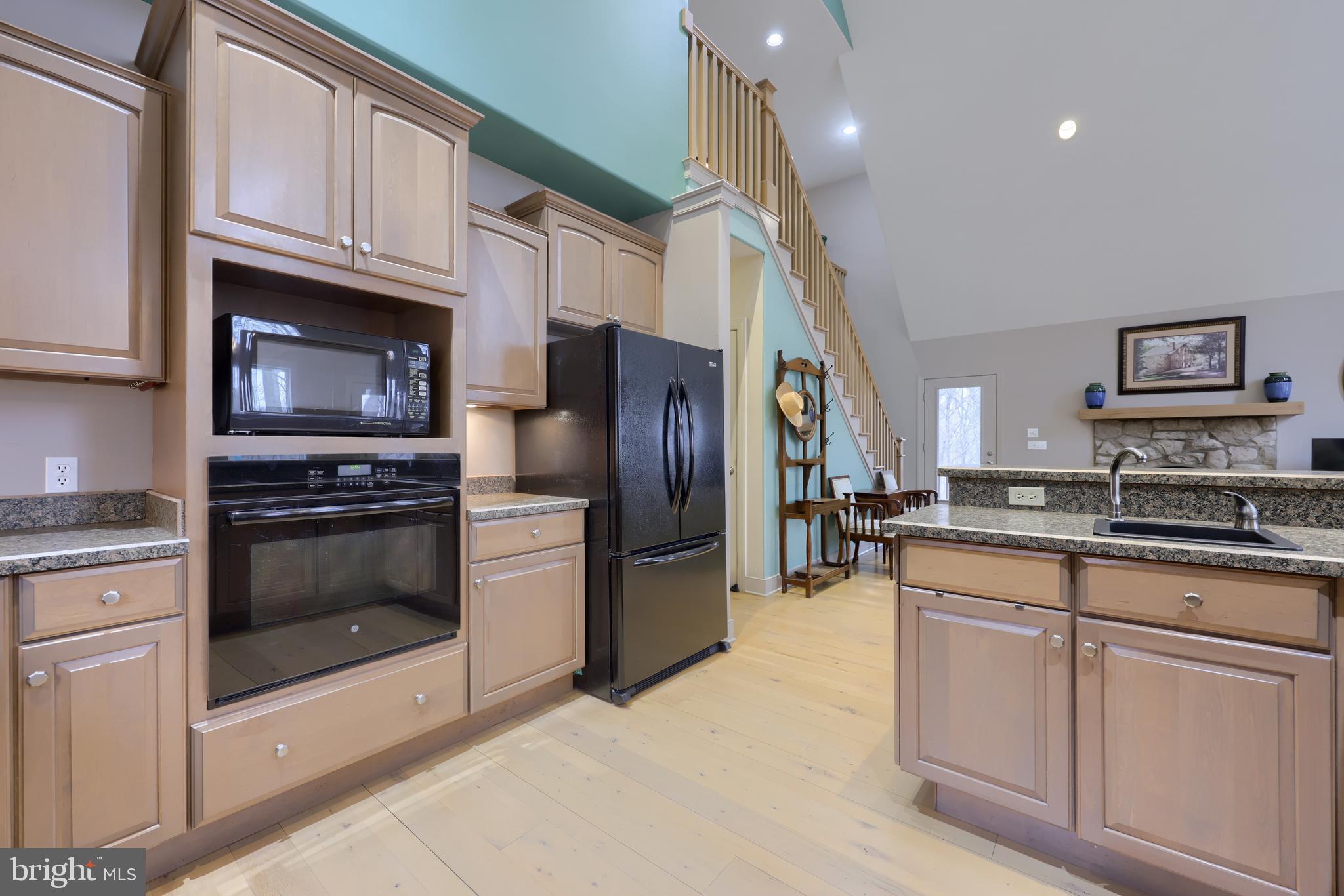 4495 Beards School Road Spring Grove, PA 17362 - Photo 9 of 57 a kitchen with cabinets stainless steel appliances and a counter
