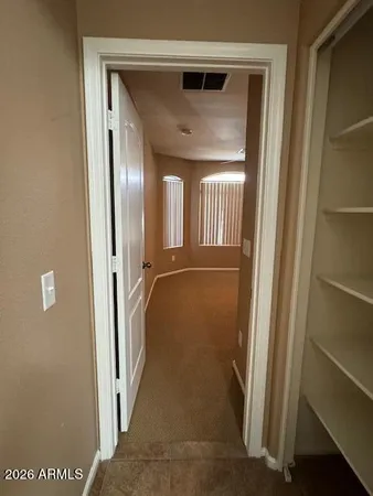 a utility room with washing machine