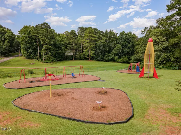 a view of a park with swings