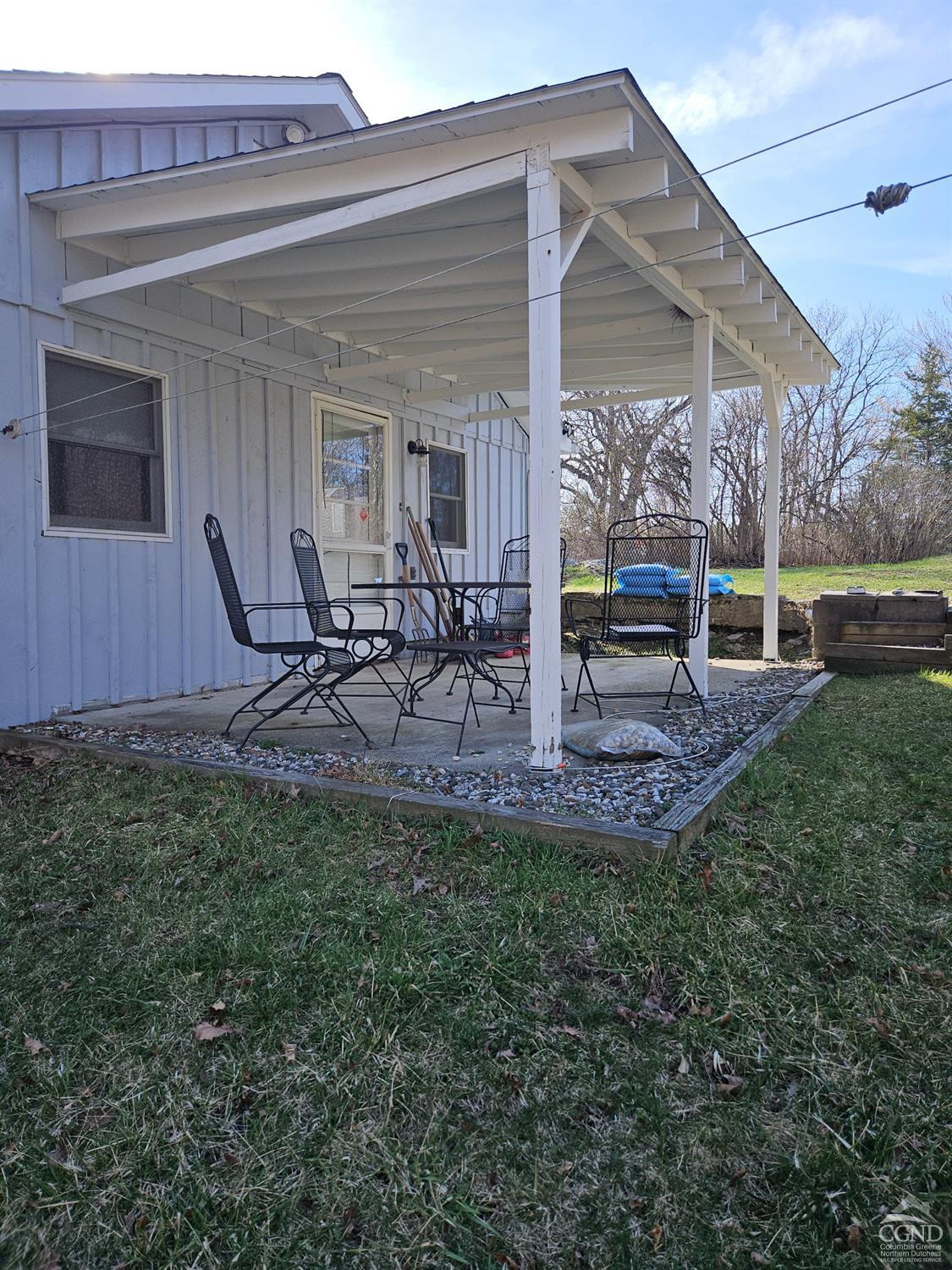 51 Dunbar Road Hudson, NY 12534 - Photo 12 of 32 a view of a house with backyard porch and sitting area
