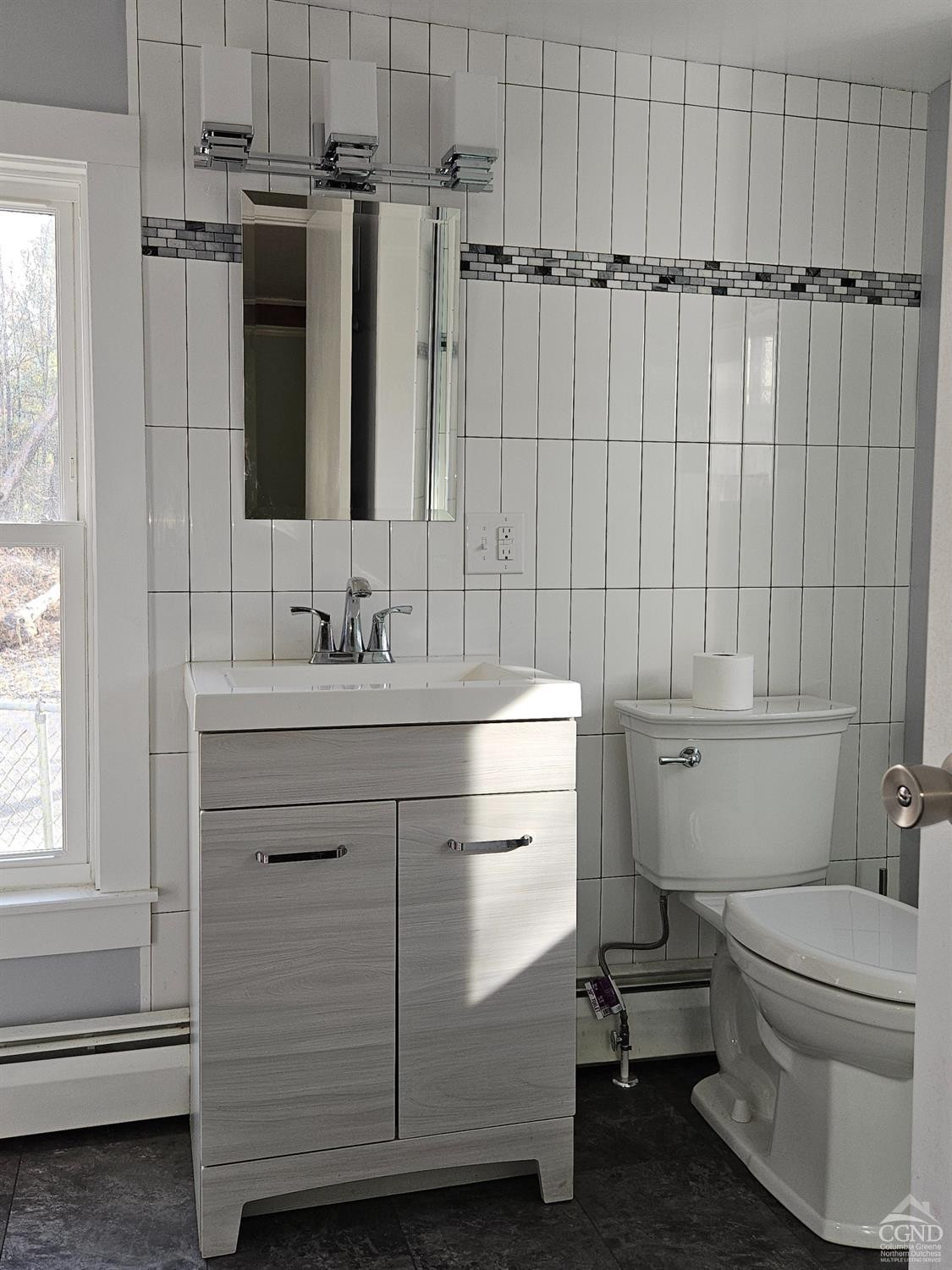 51 Dunbar Road Hudson, NY 12534 - Photo 23 of 32 a bathroom with a sink toilet and shower