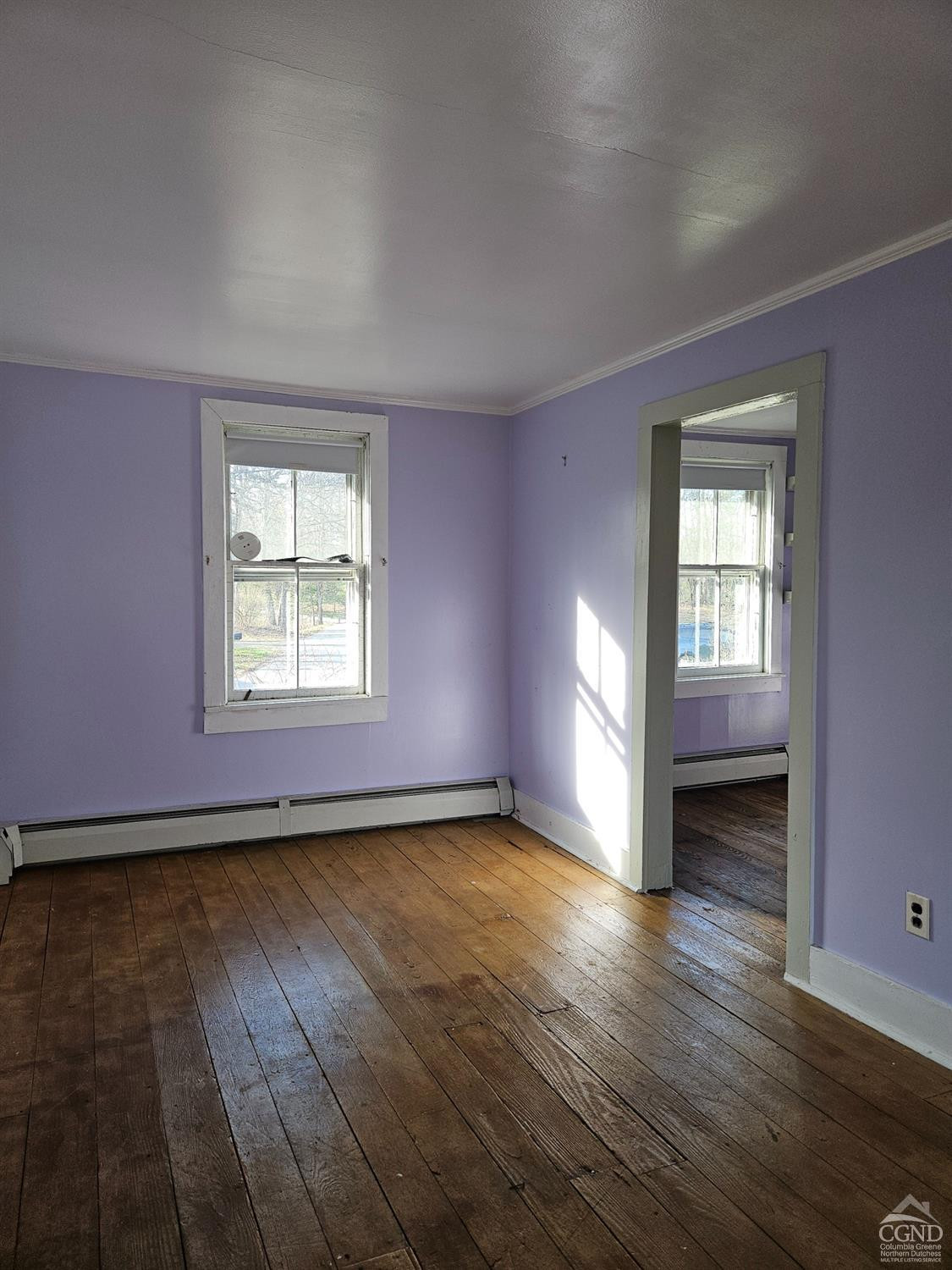 51 Dunbar Road Hudson, NY 12534 - Photo 25 of 32 an empty room with wooden floor and windows