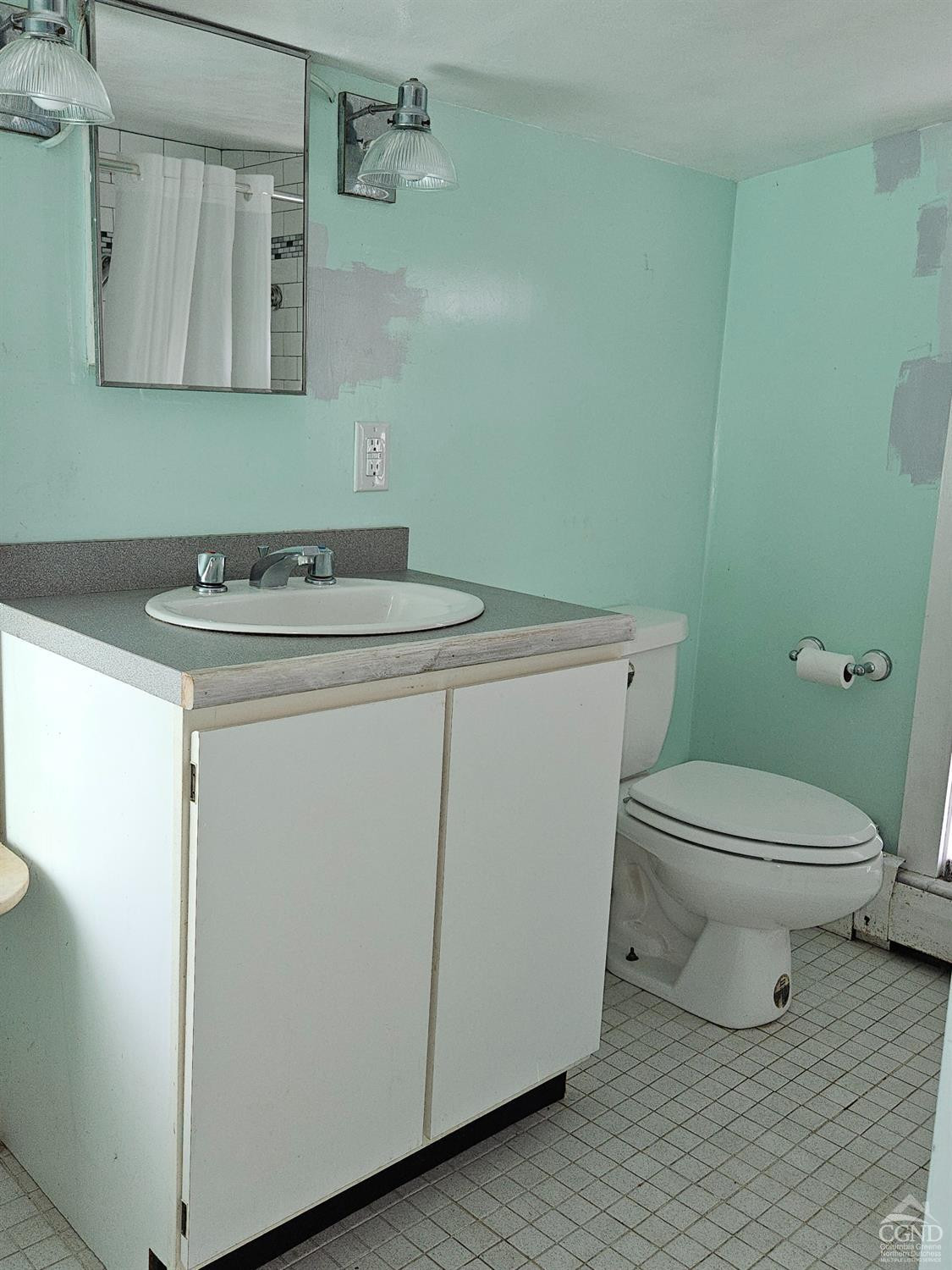 51 Dunbar Road Hudson, NY 12534 - Photo 27 of 32 a bathroom with a granite countertop toilet and a sink