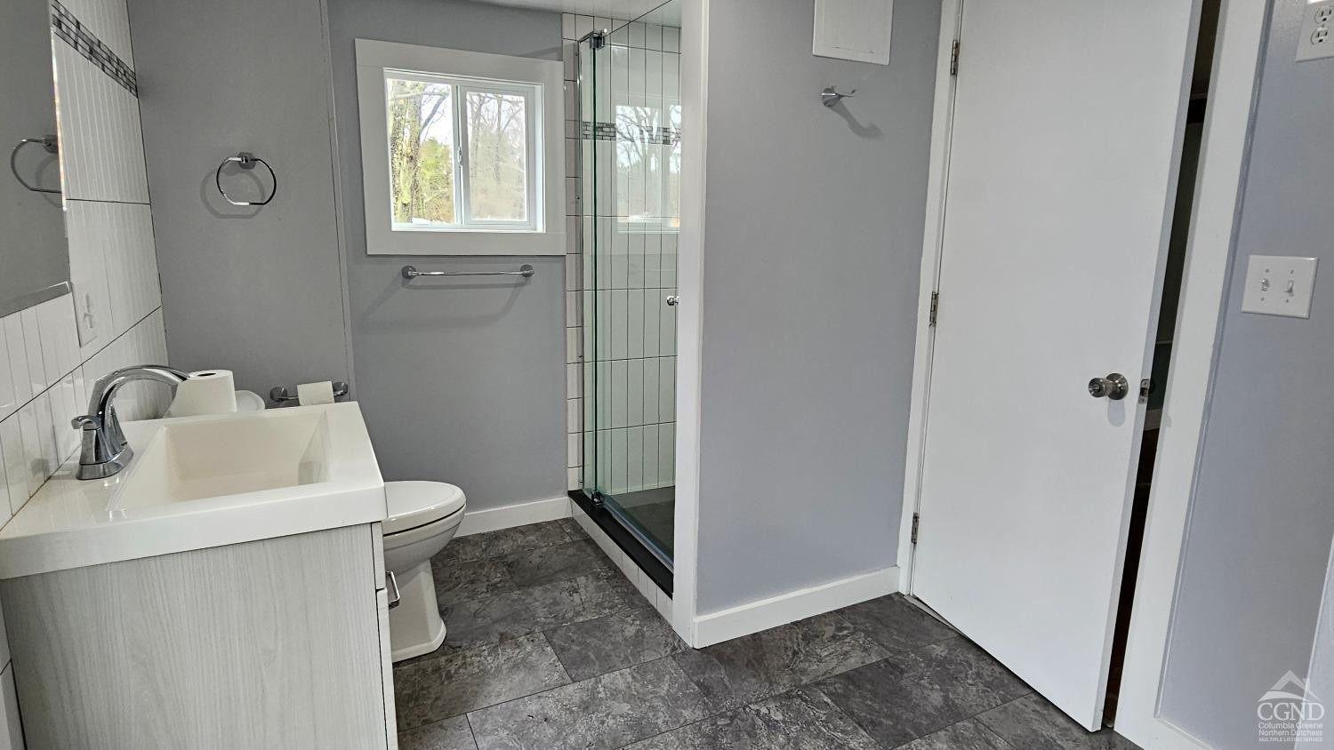 51 Dunbar Road Hudson, NY 12534 - Photo 7 of 32 a bathroom with a sink toilet and shower