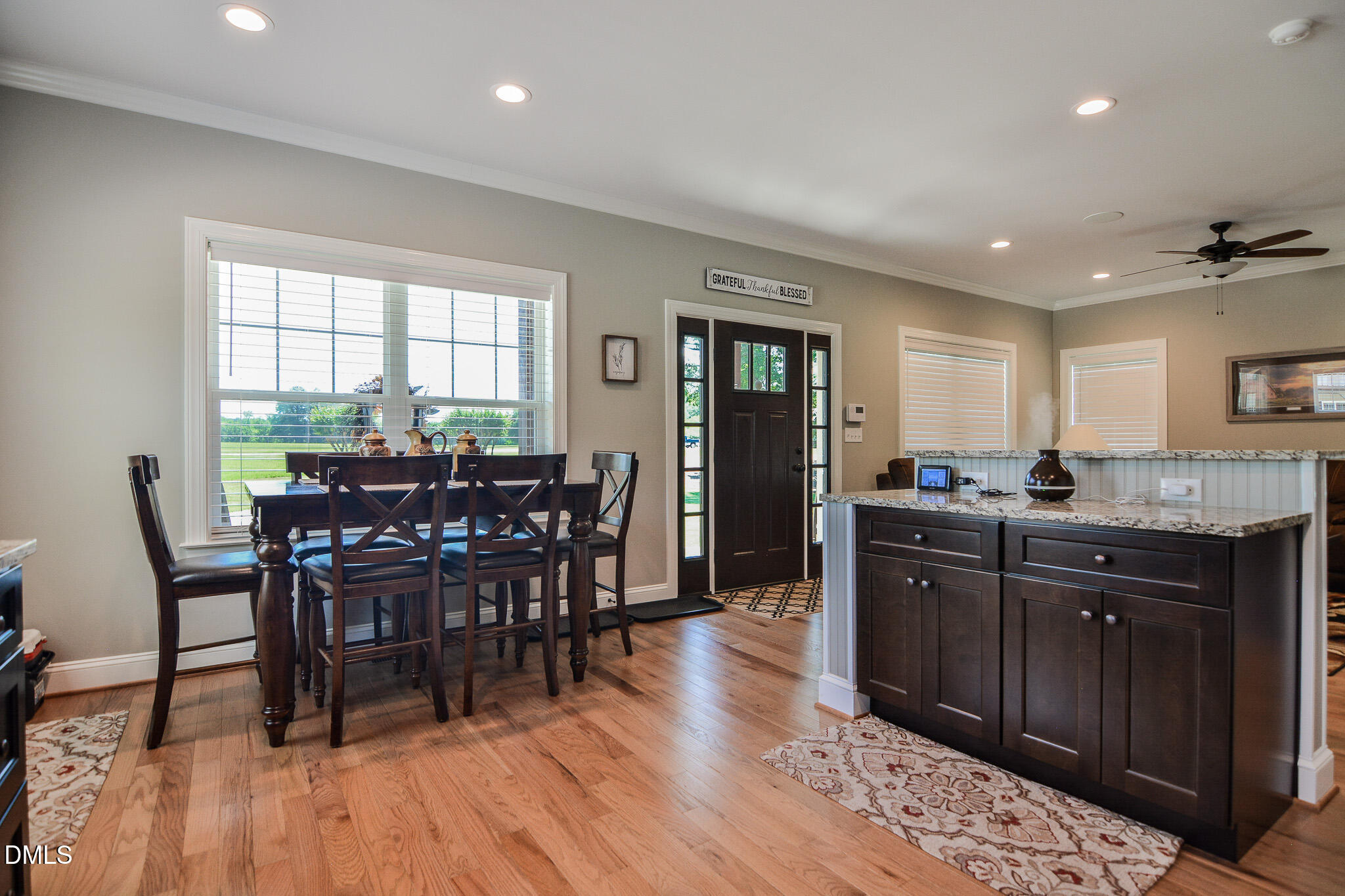 394 King Road Castalia, NC 27816 - Photo 20 of 100 a view of a dining room with furniture and wooden floor