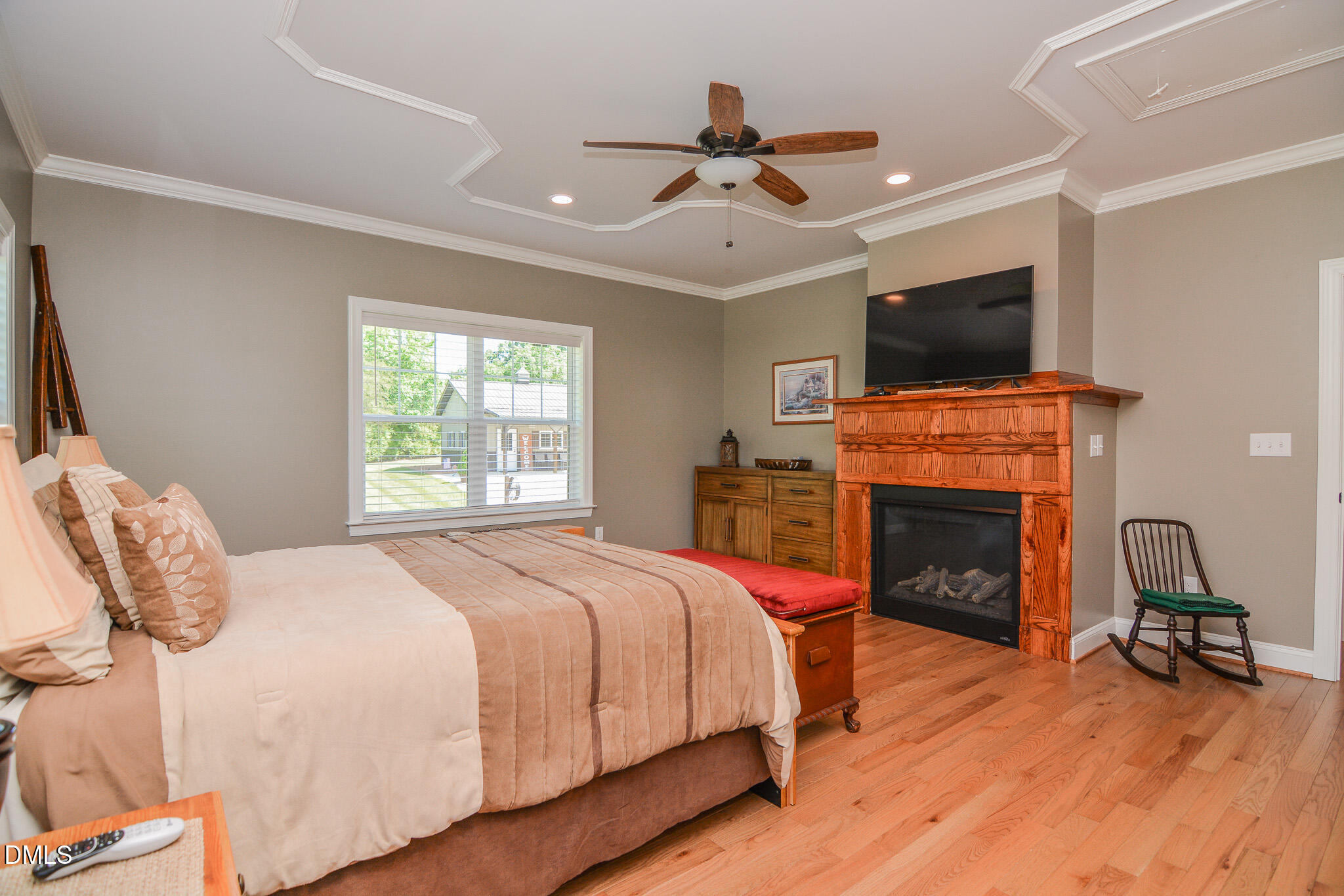 394 King Road Castalia, NC 27816 - Photo 23 of 100 a bedroom with a bed and a fireplace