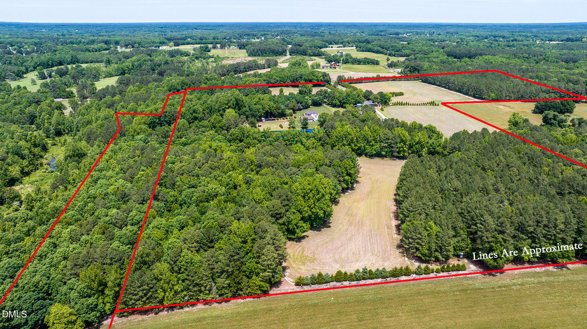 394 King Road Castalia, NC 27816 - Photo 3 of 100 a view of a garden with a lake view
