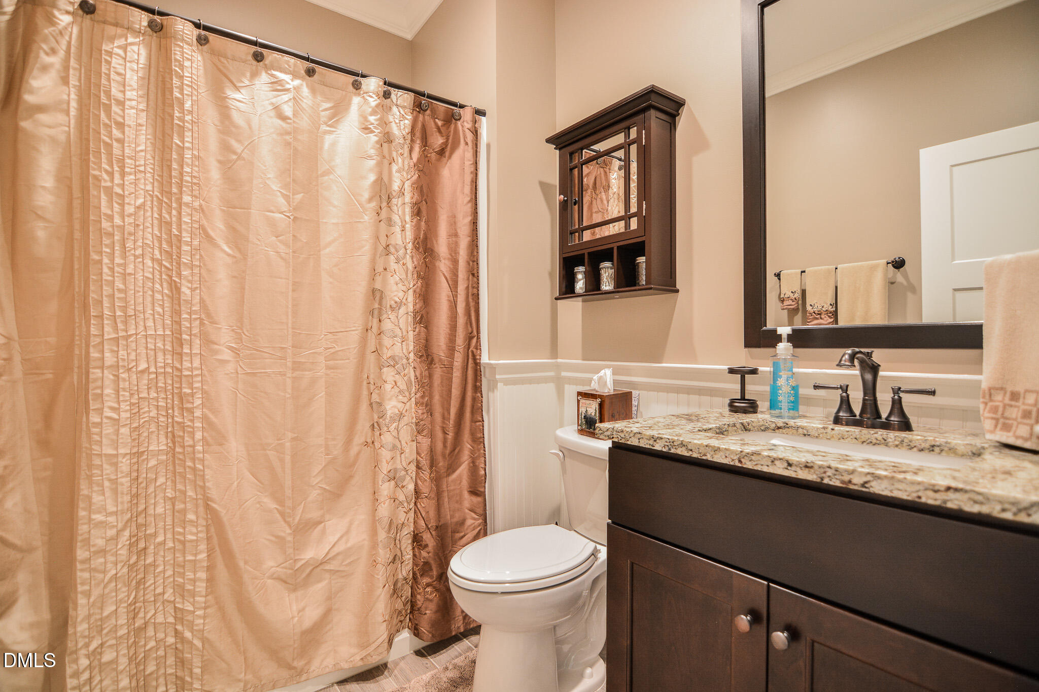 394 King Road Castalia, NC 27816 - Photo 31 of 100 a bathroom with a granite countertop sink toilet and a mirror