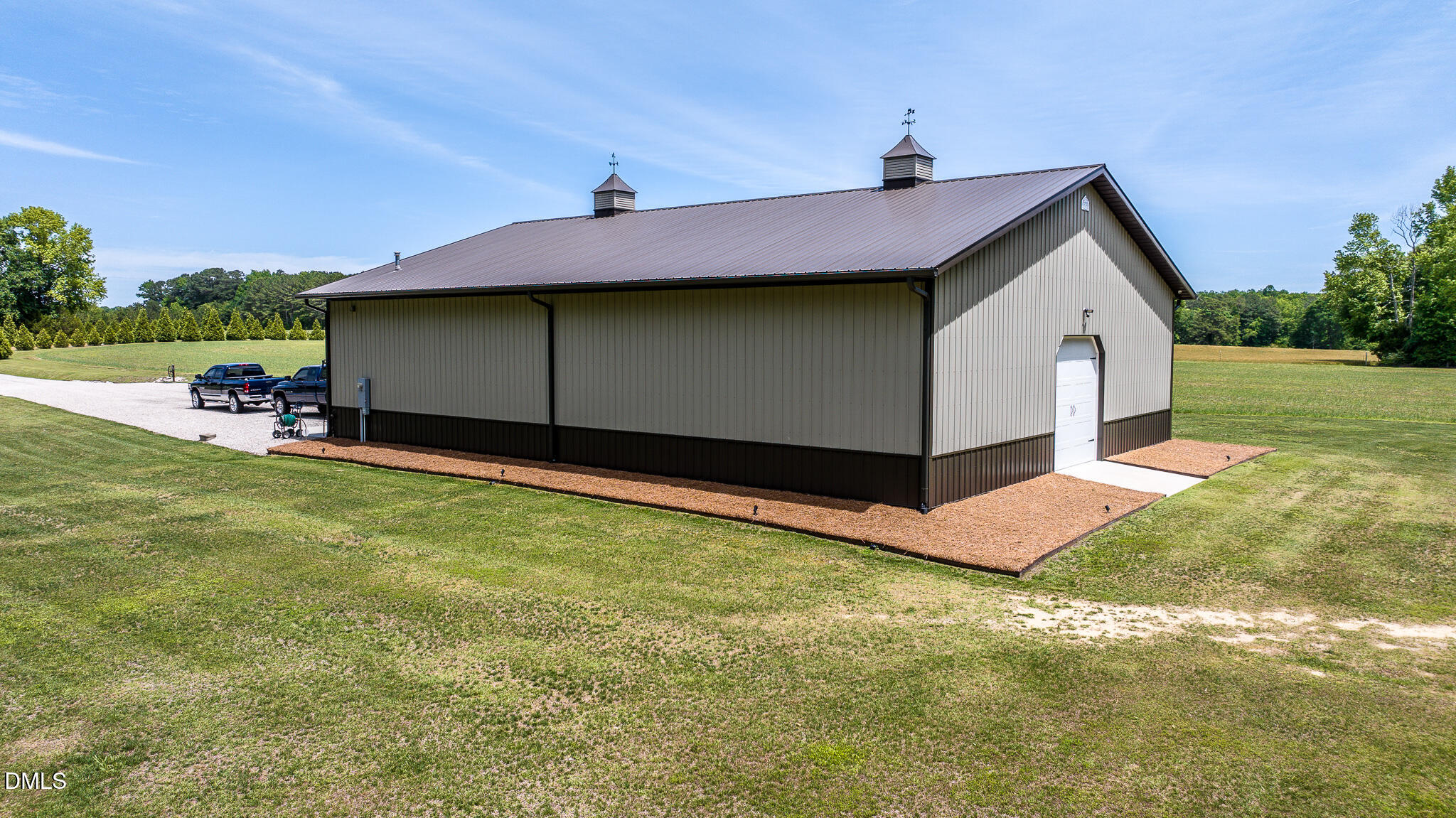 394 King Road Castalia, NC 27816 - Photo 37 of 100 a front view of a house with a yard and garage