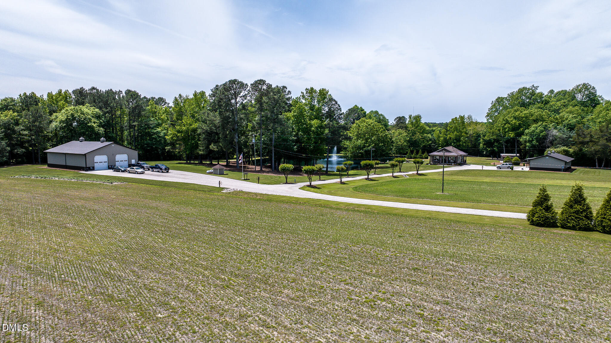 394 King Road Castalia, NC 27816 - Photo 42 of 100 a view of a swimming pool and trees in the background