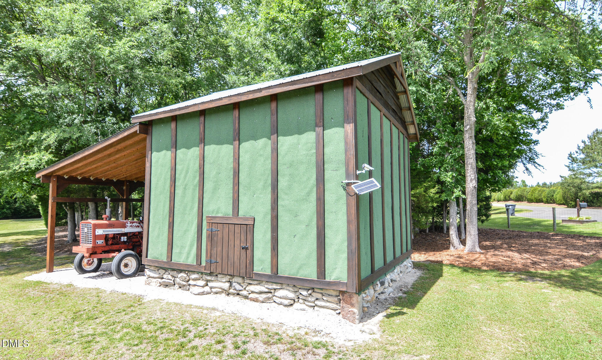 394 King Road Castalia, NC 27816 - Photo 46 of 100 a backyard of a house with table and chairs