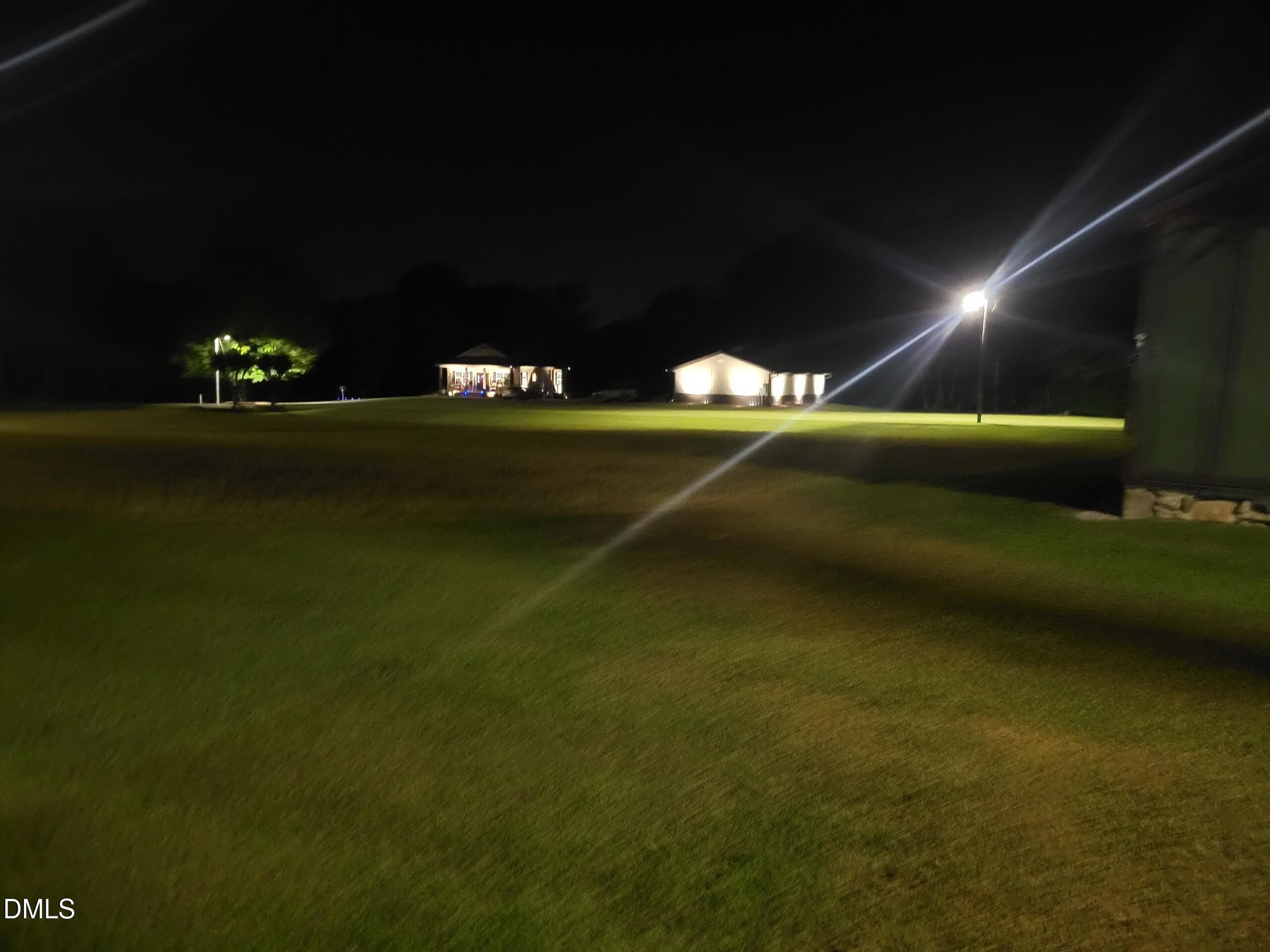 394 King Road Castalia, NC 27816 - Photo 56 of 100 a view of a golf course with chairs
