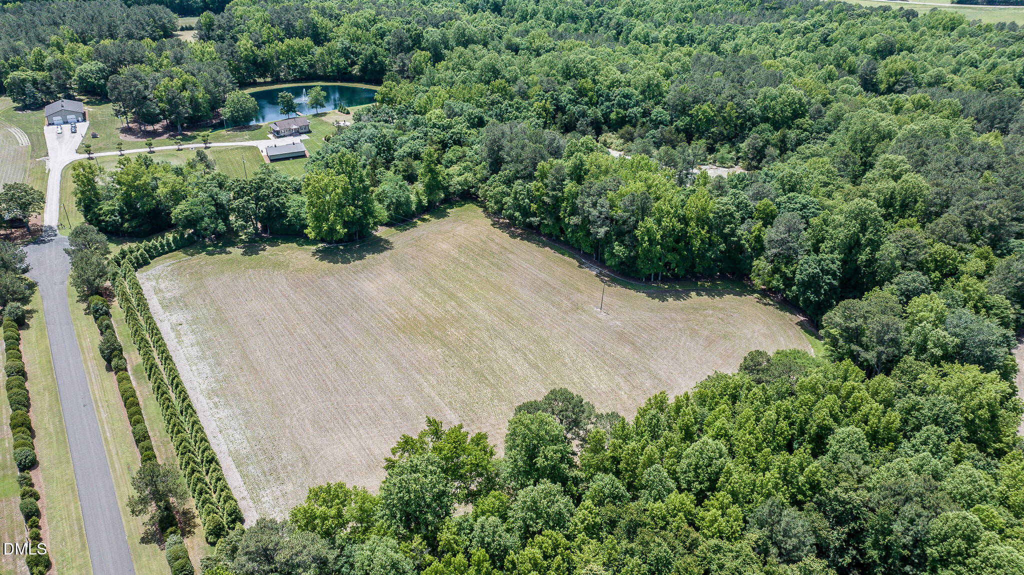 394 King Road Castalia, NC 27816 - Photo 67 of 100 an aerial view of residential house with outdoor space and trees all around
