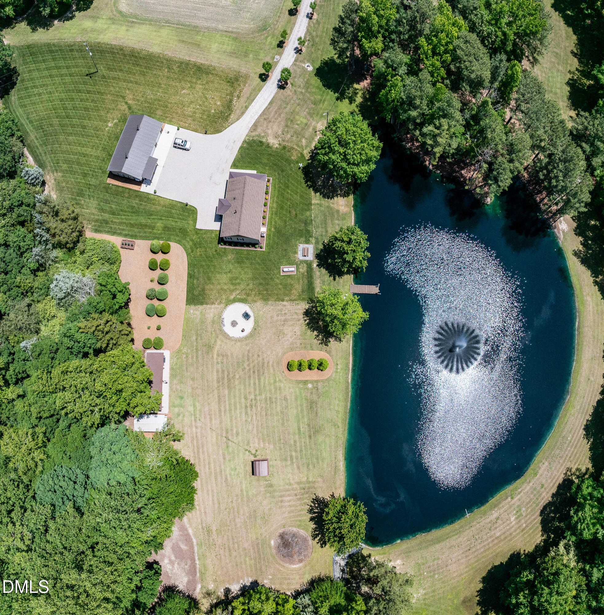 394 King Road Castalia, NC 27816 - Photo 85 of 100 an aerial view of a house with outdoor space and a lake view in back