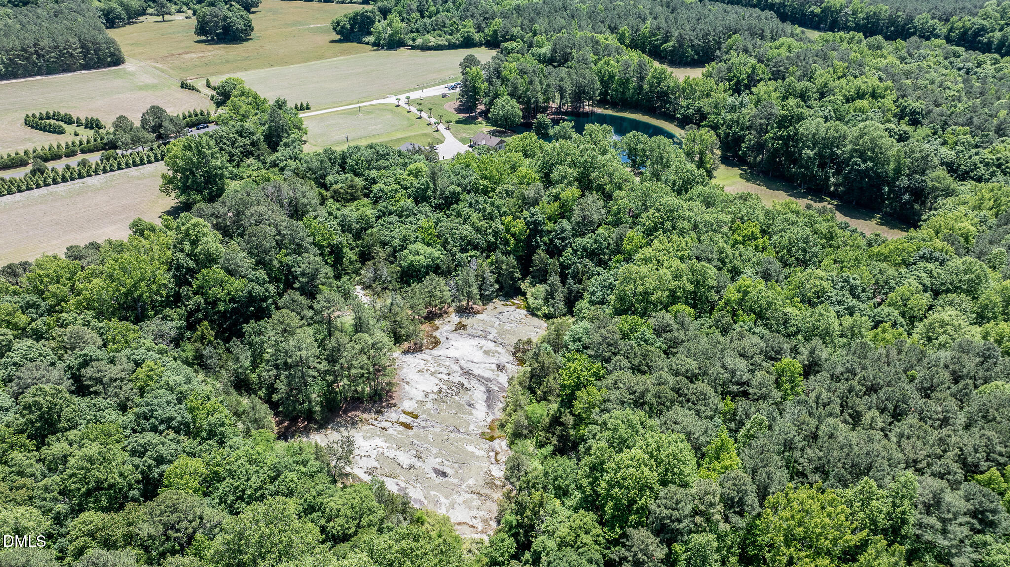 394 King Road Castalia, NC 27816 - Photo 98 of 100 an aerial view of a house with a yard and outdoor seating