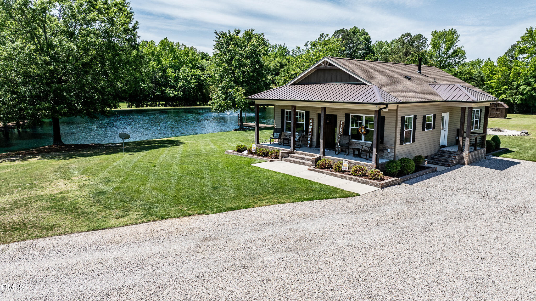 394 King Road Castalia, NC 27816 - Photo 10 of 100 a view of a house with garden and a patio