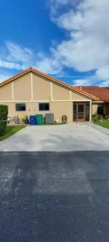 a kitchen with a sink stove and refrigerator