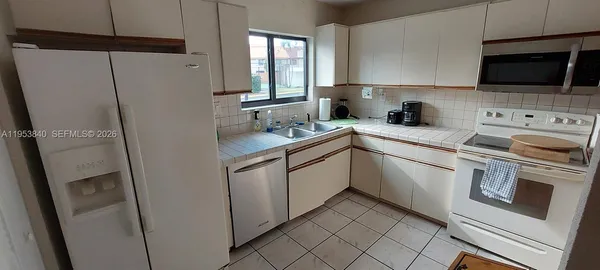 a dining room with furniture