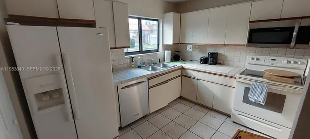 a dining room with furniture
