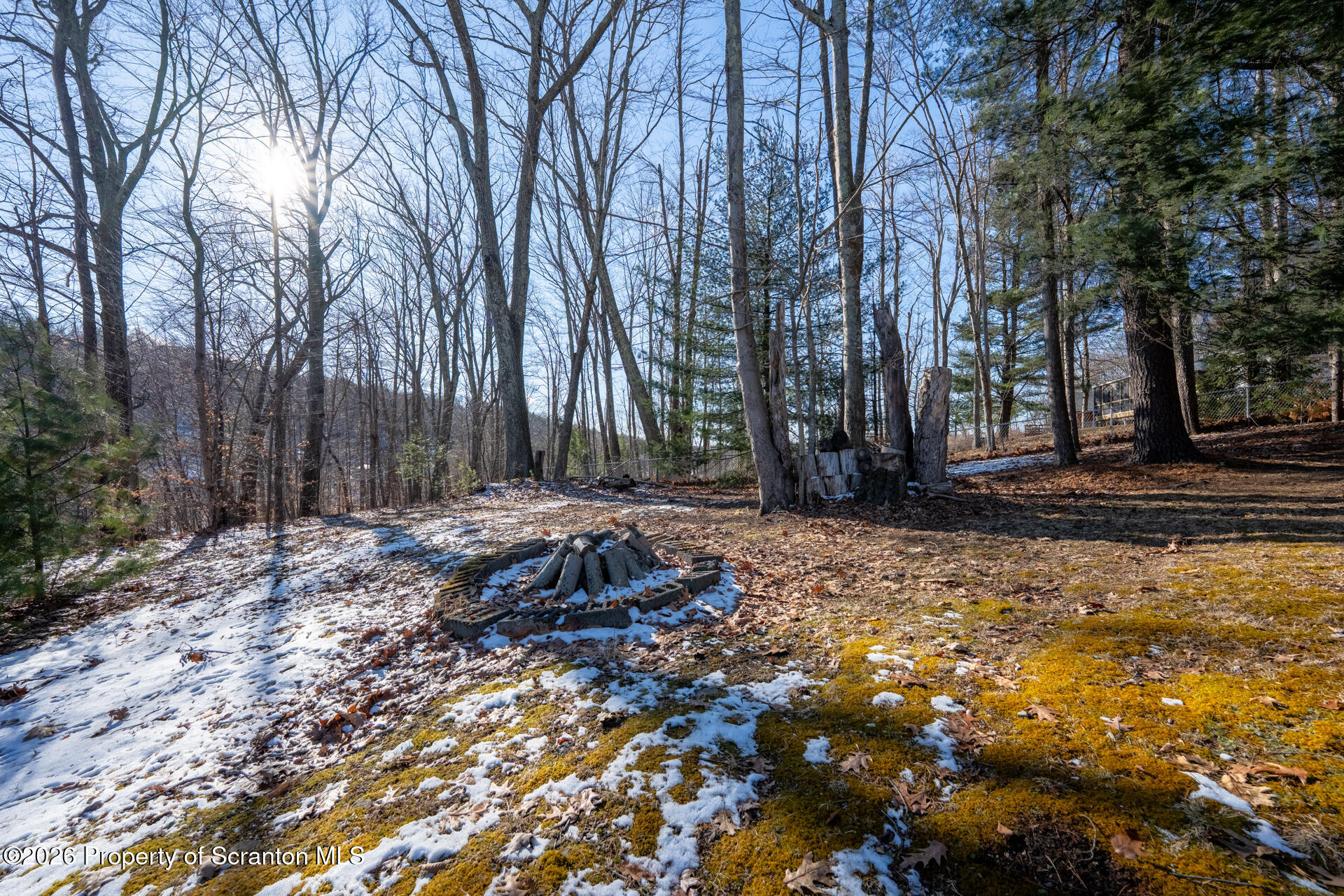 13 Hillside Drive Nicholson, PA 18446 - Photo 12 of 34 a backyard of a house with lots of green space and fountain
