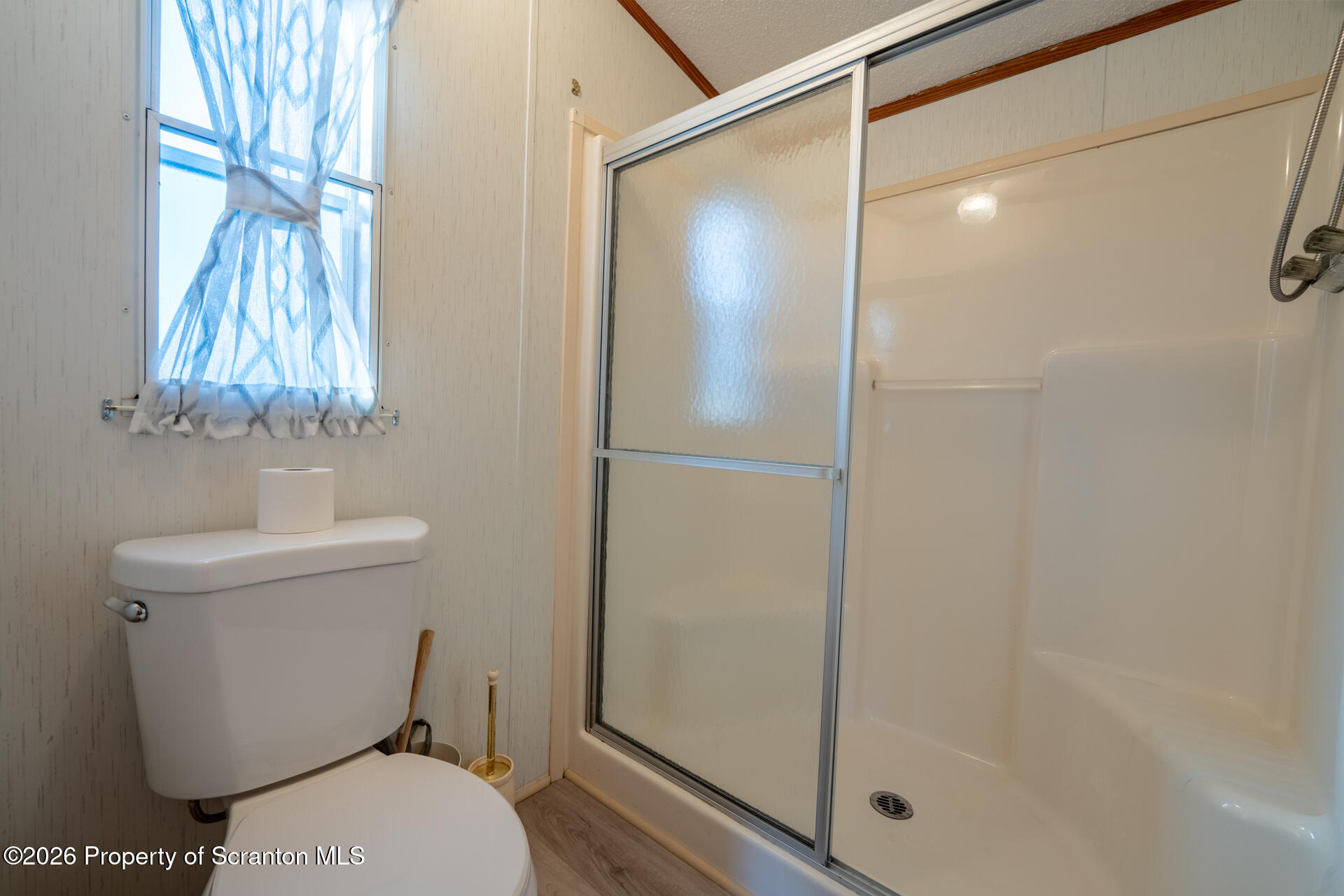 13 Hillside Drive Nicholson, PA 18446 - Photo 24 of 34 a bathroom with a toilet and a shower