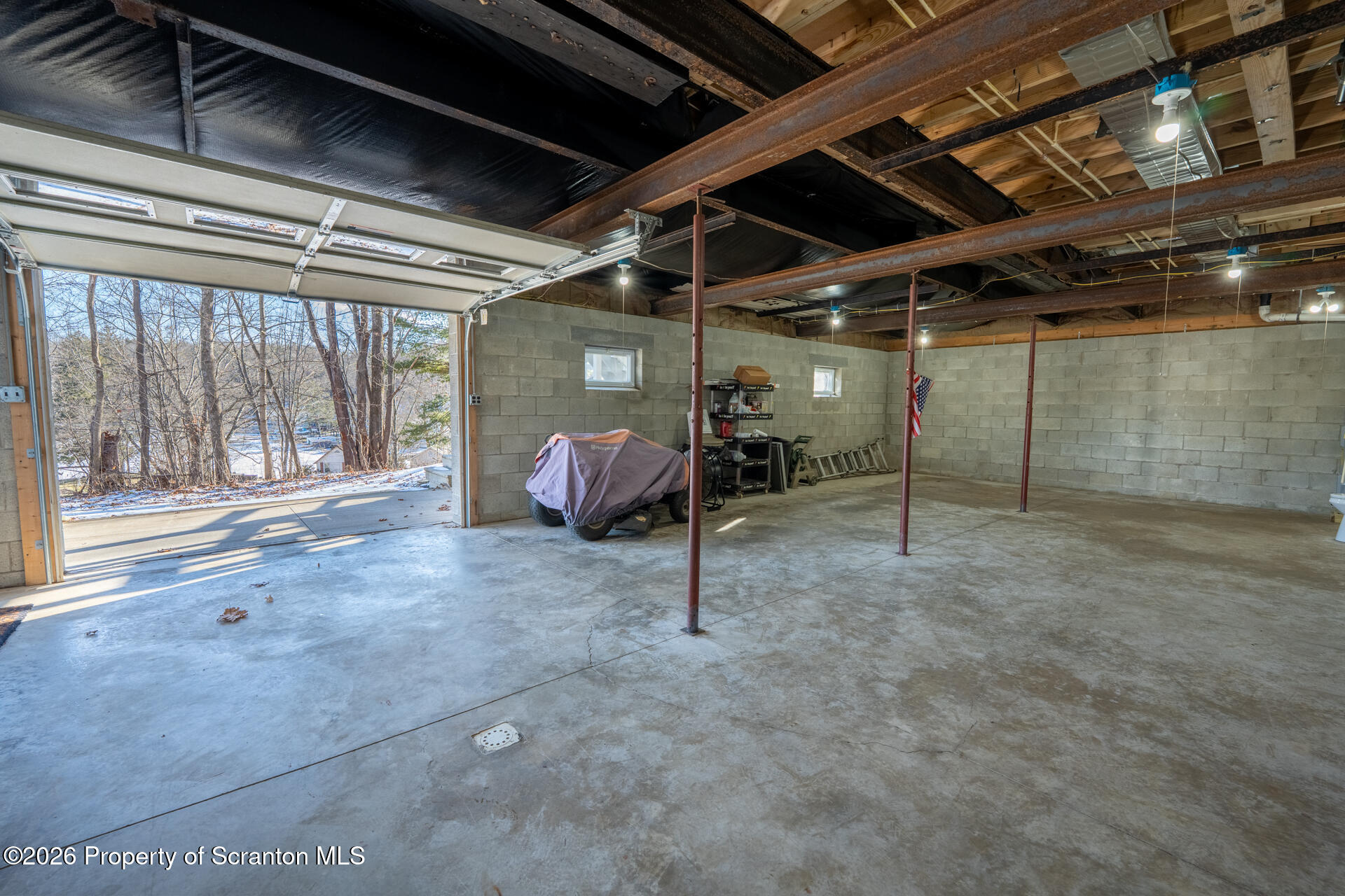 13 Hillside Drive Nicholson, PA 18446 - Photo 32 of 34 a view of a room with wooden floor and furniture