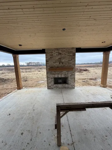 a bathroom with a tub and shower