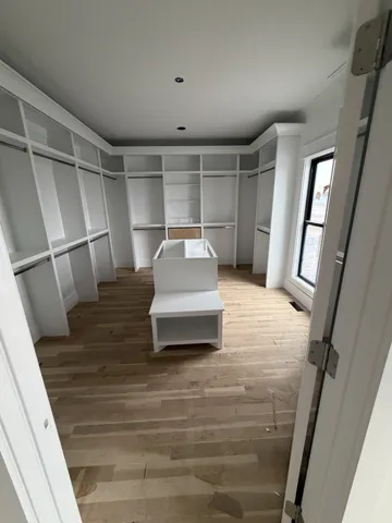a view of an empty walk in closet