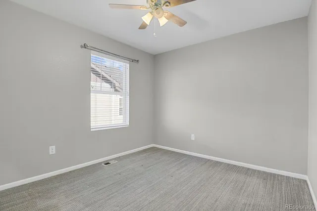 an empty room with a hallway