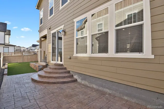a front view of a house with a garage