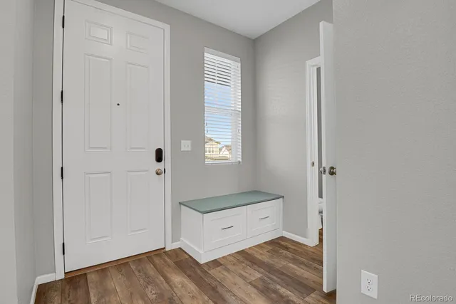 a workspace with furniture and window