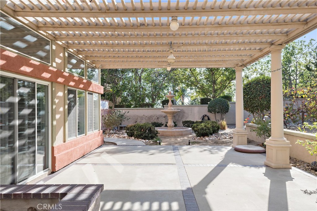 4954 Crestview Place Rancho Cucamonga, CA 91701 - Photo 12 of 40 a view of a patio with furniture and a backyard