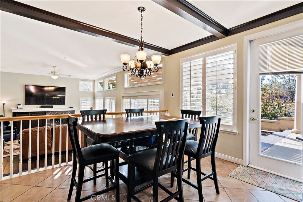 4954 Crestview Place Rancho Cucamonga, CA 91701 - Photo 17 of 40 a view of a dining room with furniture window and outside view