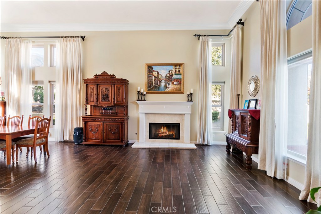 4954 Crestview Place Rancho Cucamonga, CA 91701 - Photo 25 of 40 a living room with furniture and a fireplace