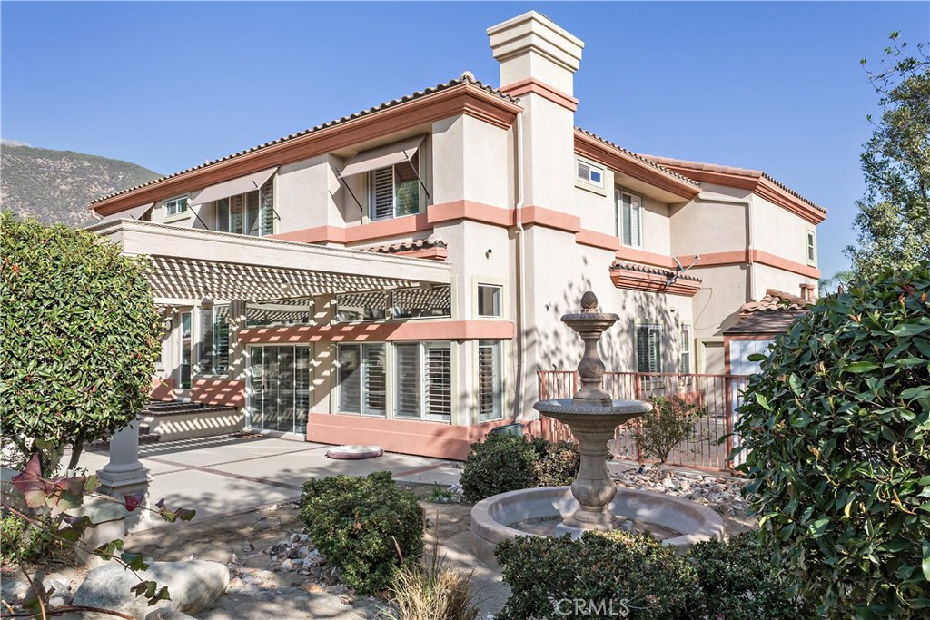 4954 Crestview Place Rancho Cucamonga, CA 91701 - Photo 6 of 40 a front view of a house with a yard