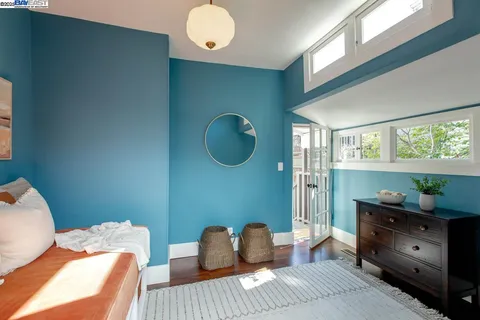 a view of a dining room with furniture wooden floor and chandelier