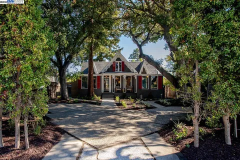 a view of a town with large trees
