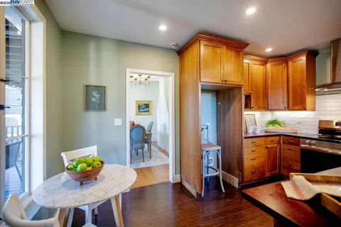 a bed room with a bed mirror and a window