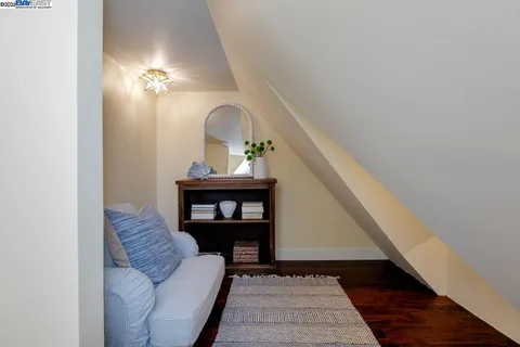 a view of backyard with deck area and outdoor seating