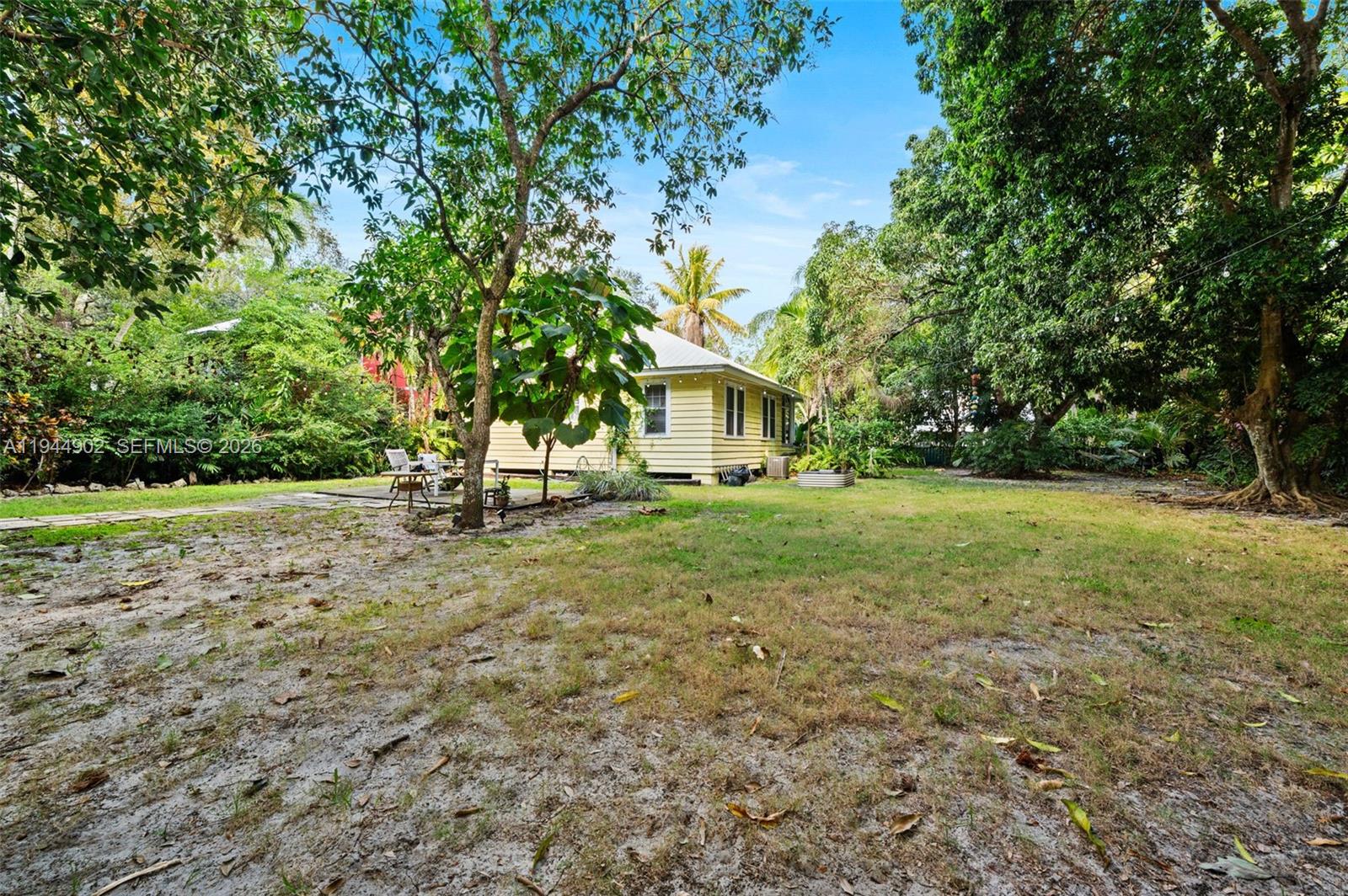 3972 Loquat Avenue Miami, FL 33133 - Photo 2 of 9 a view of backyard with green space