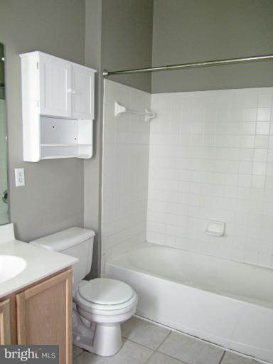 107 Bishopstone Circle Frederick, MD 21702 - Photo 12 of 21 a white toilet sitting next to a bath tub