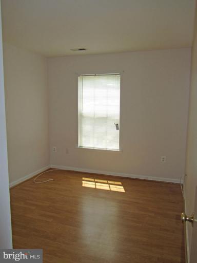 107 Bishopstone Circle Frederick, MD 21702 - Photo 14 of 21 an empty room with a window