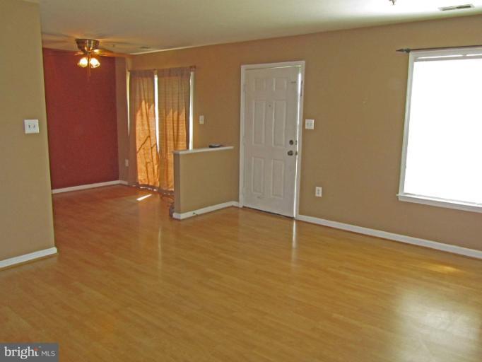 107 Bishopstone Circle Frederick, MD 21702 - Photo 3 of 21 an empty room with windows and closet