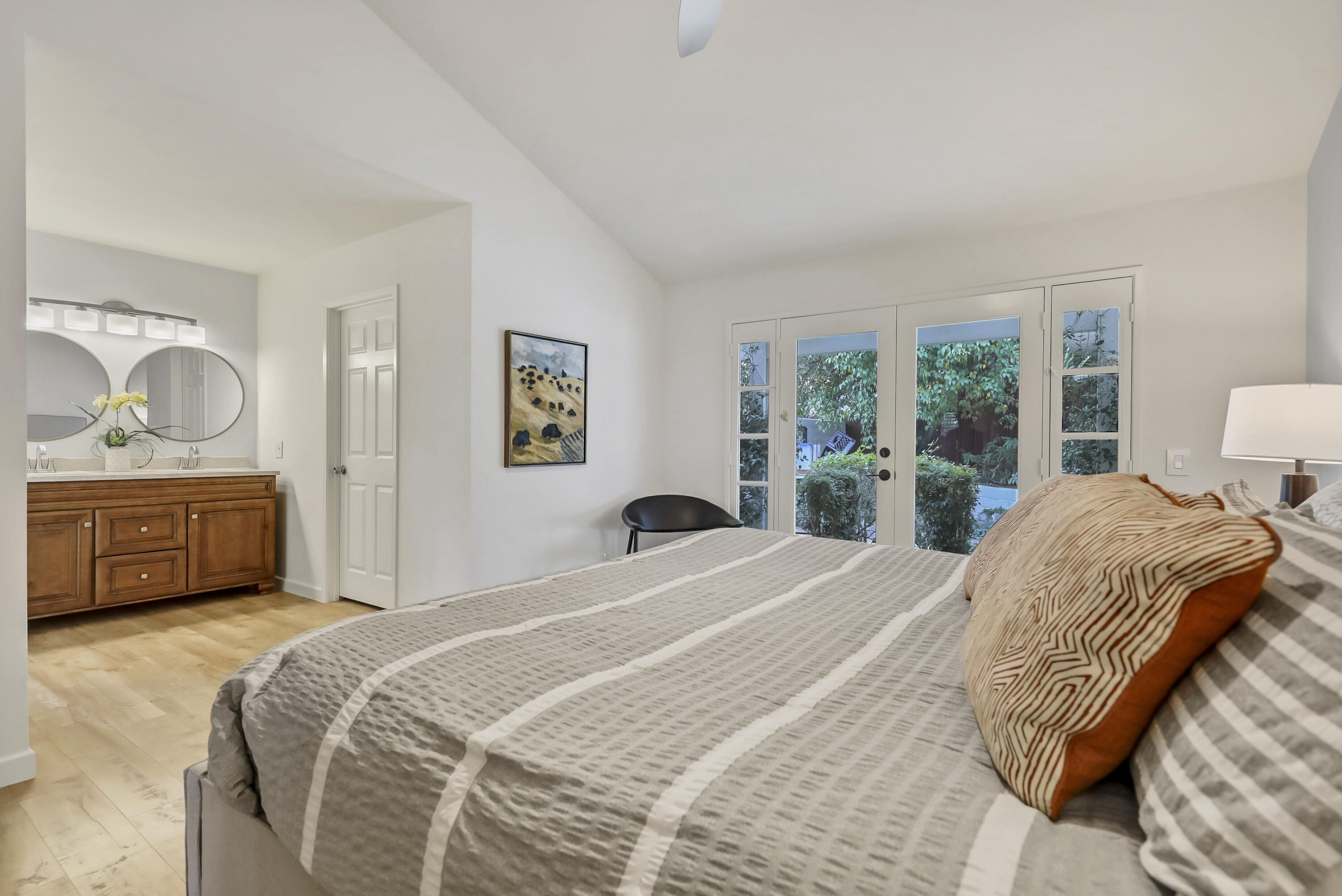 73517 Haystack Road Palm Desert, CA 92260 - Photo 21 of 26 a bedroom with a bed and a view of bedroom