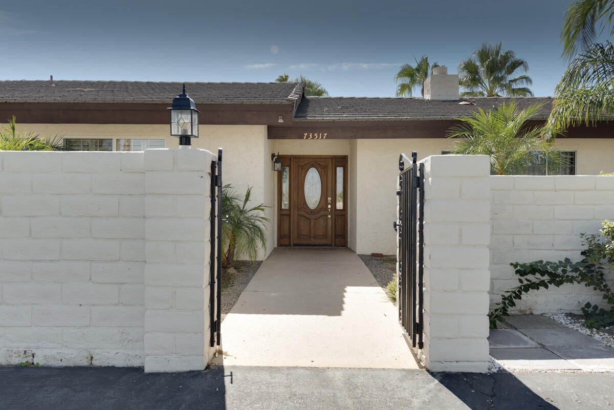 73517 Haystack Road Palm Desert, CA 92260 - Photo 4 of 26 a view of a entryway door of the house